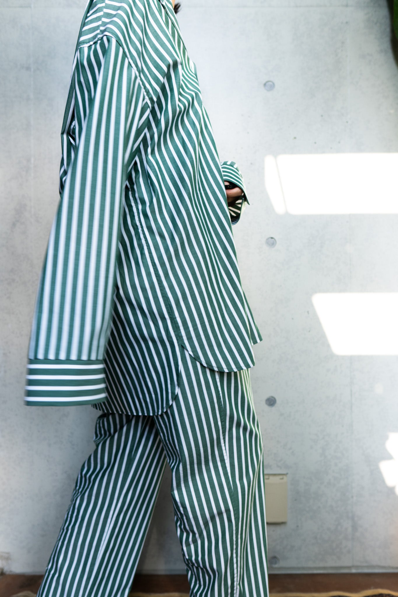 his shirt-green stripe