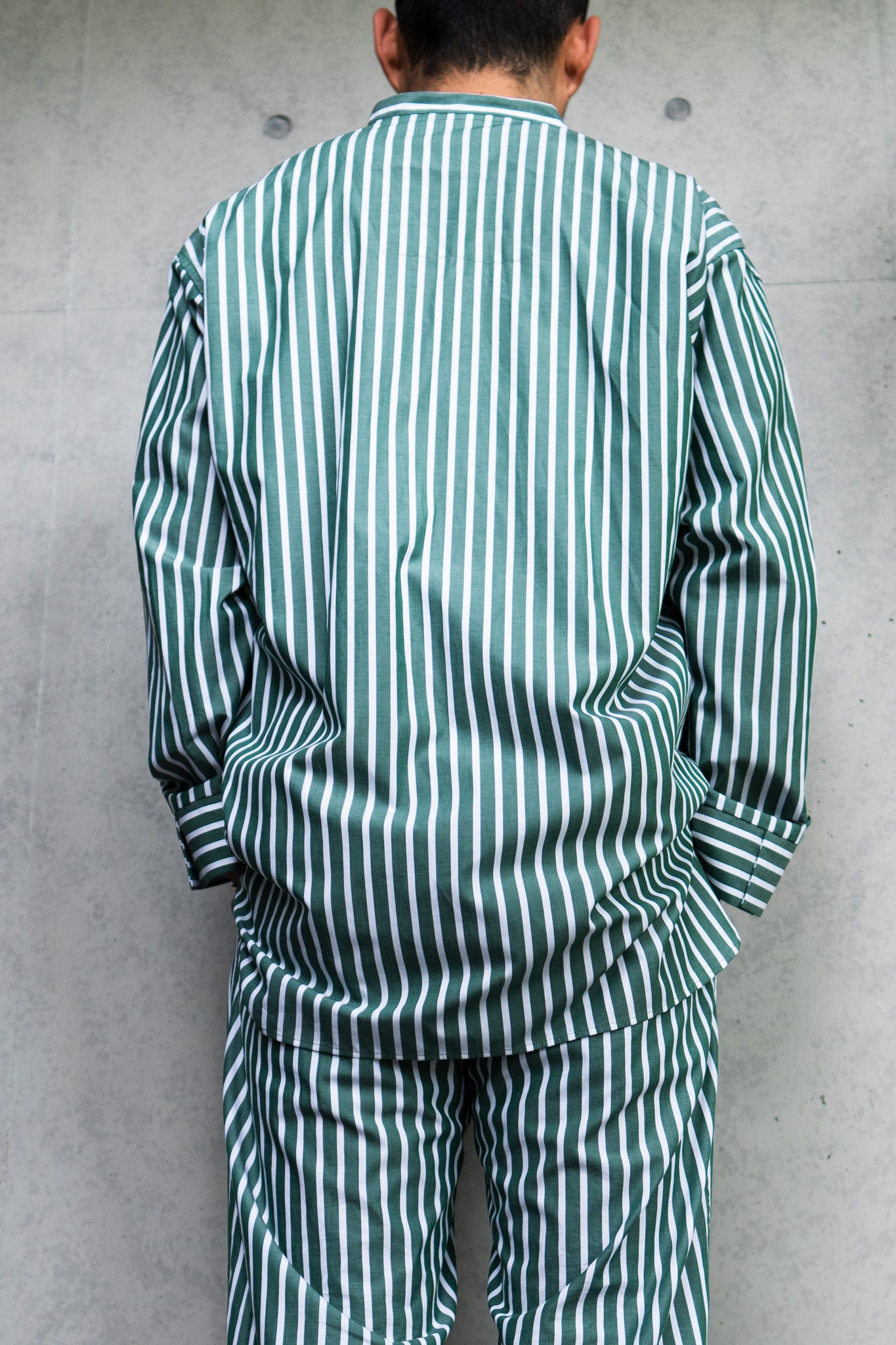 his shirt-green stripe