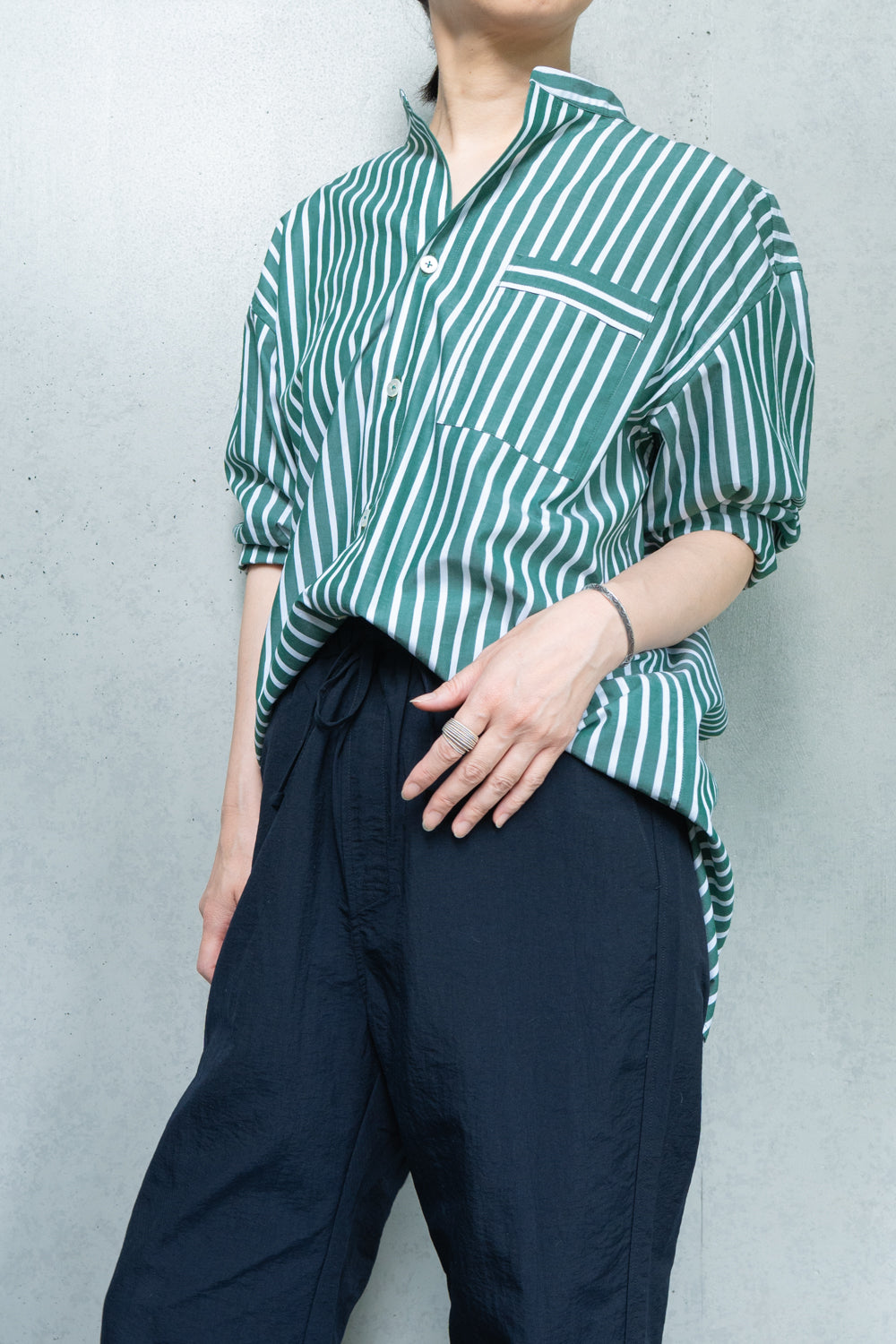 his shirt-green stripe