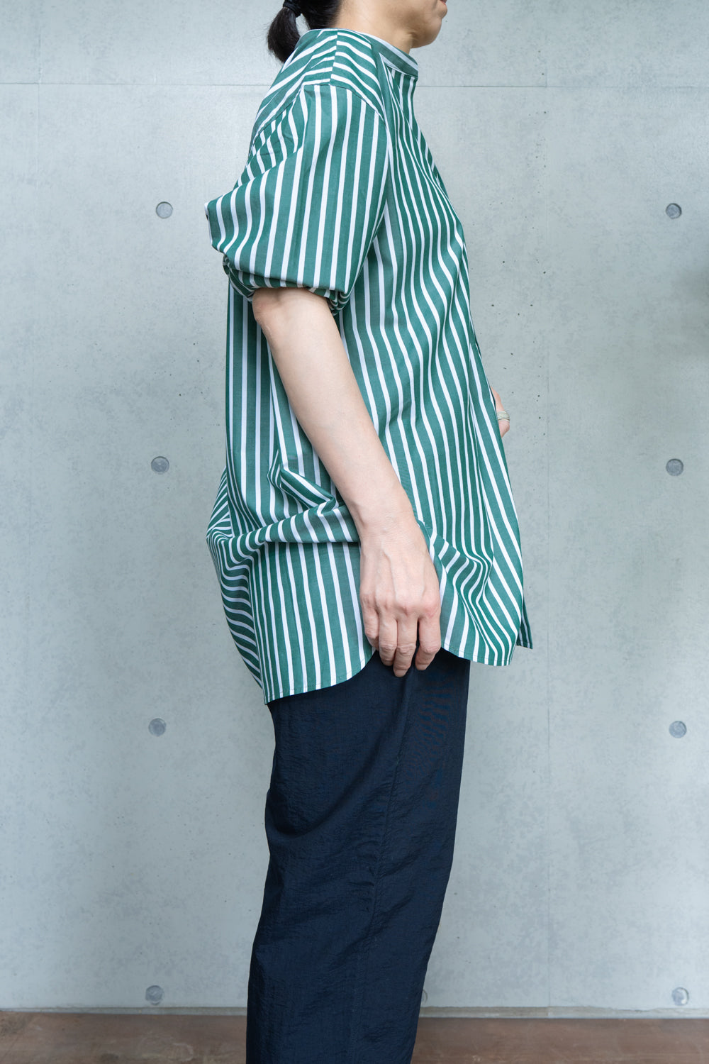 his shirt-green stripe