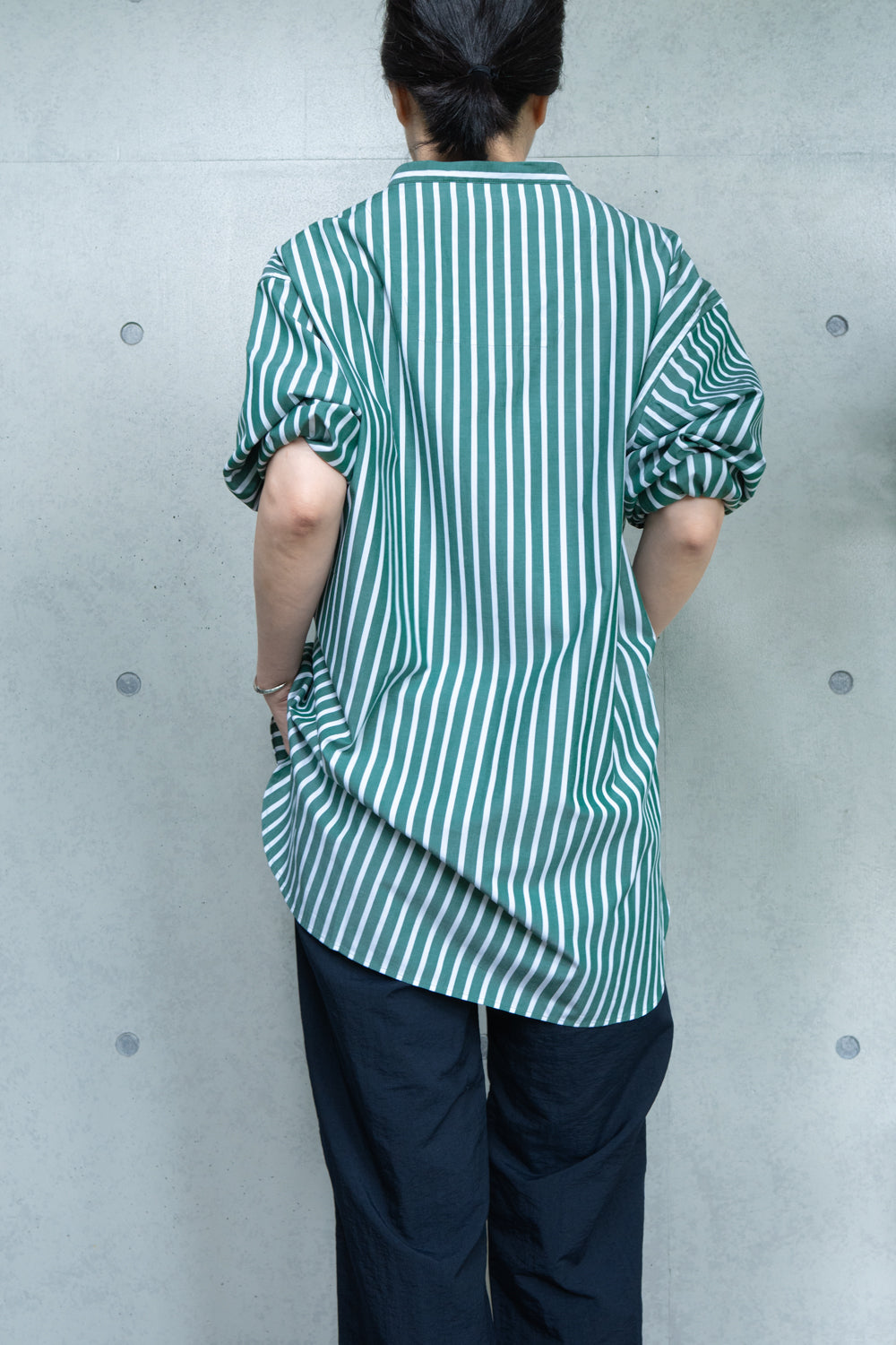 his shirt-green stripe