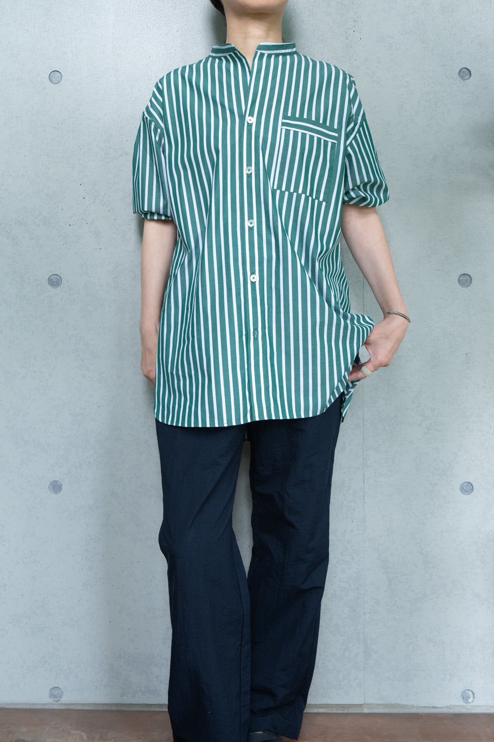 his shirt-green stripe