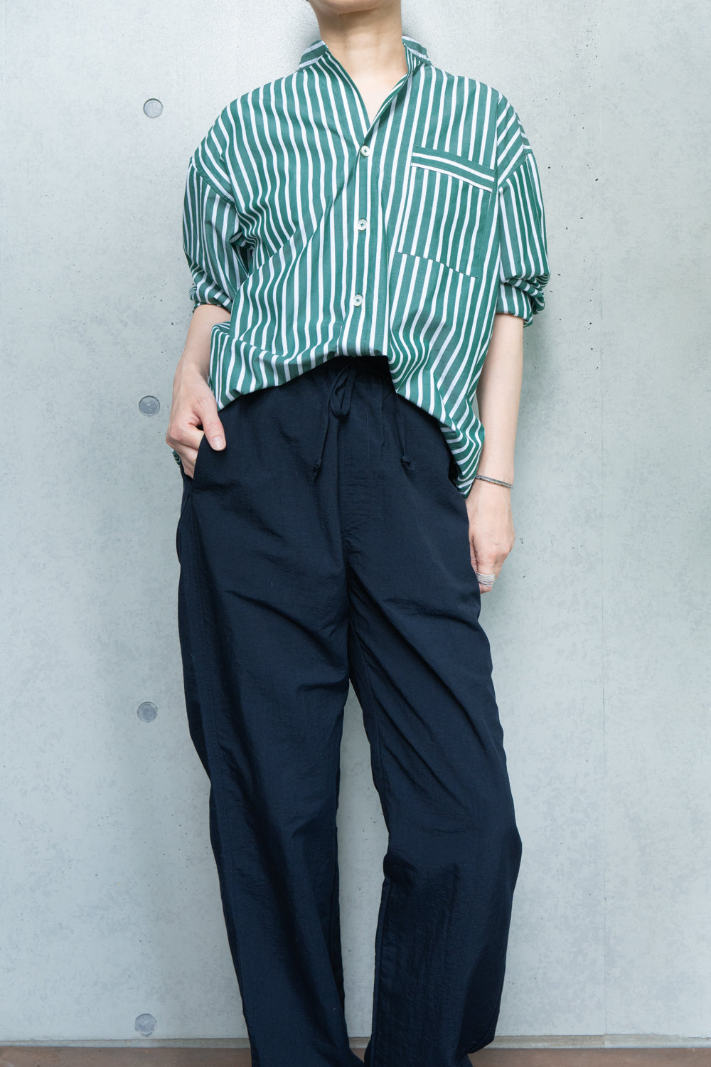 his shirt-green stripe