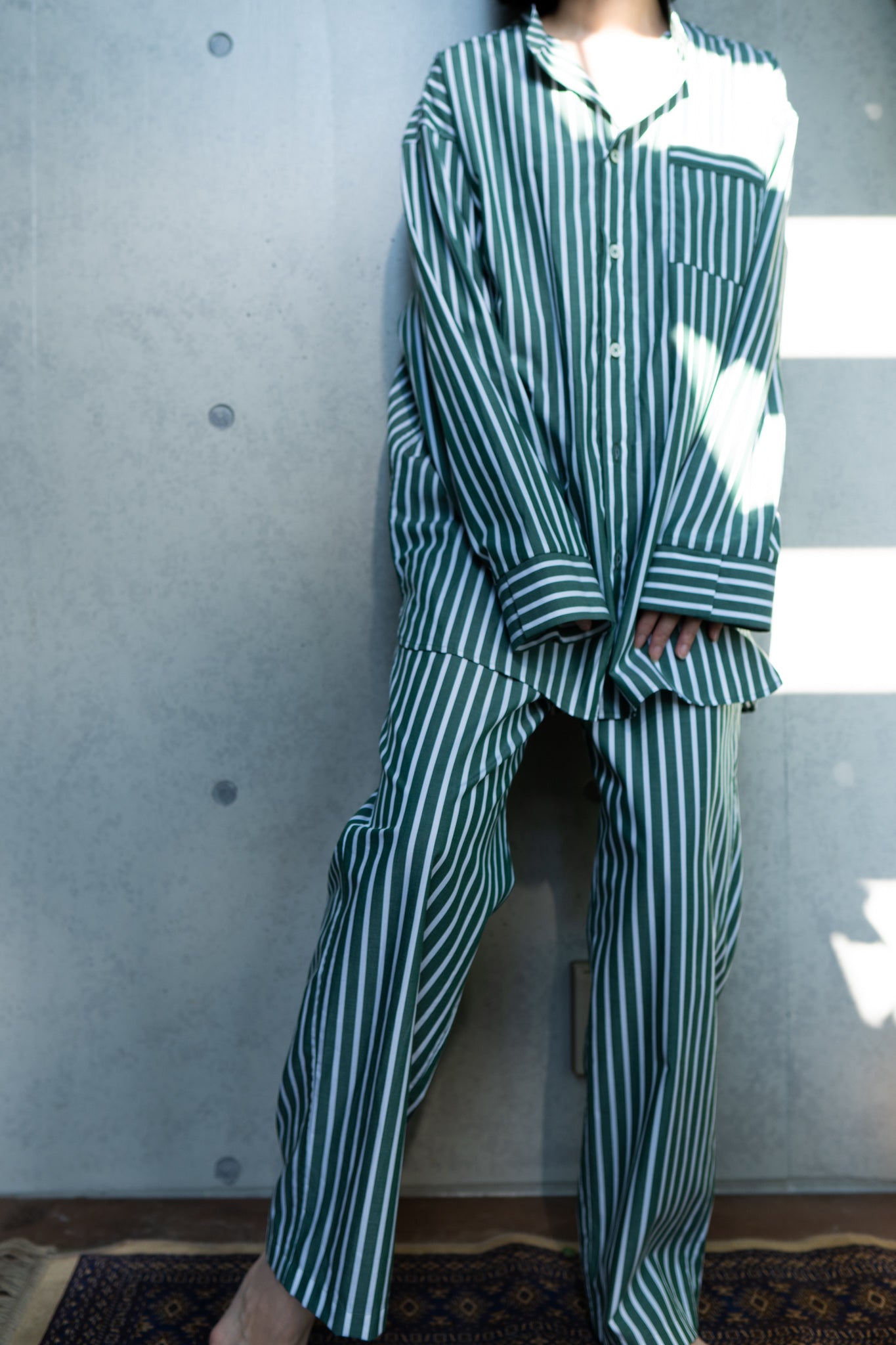 his shirt-green stripe