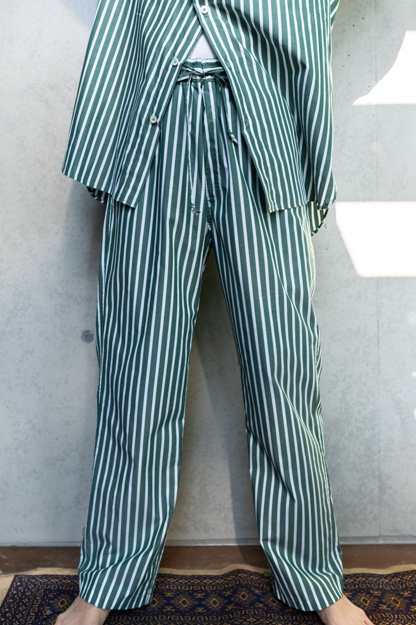 his pants-green stripe