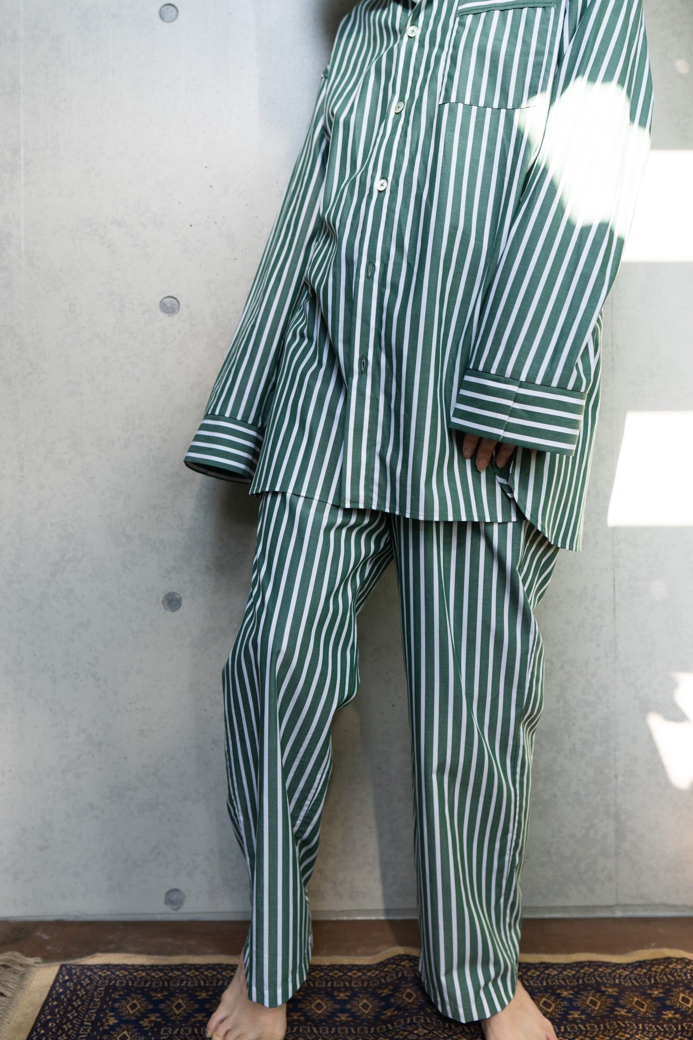 his shirt-green stripe