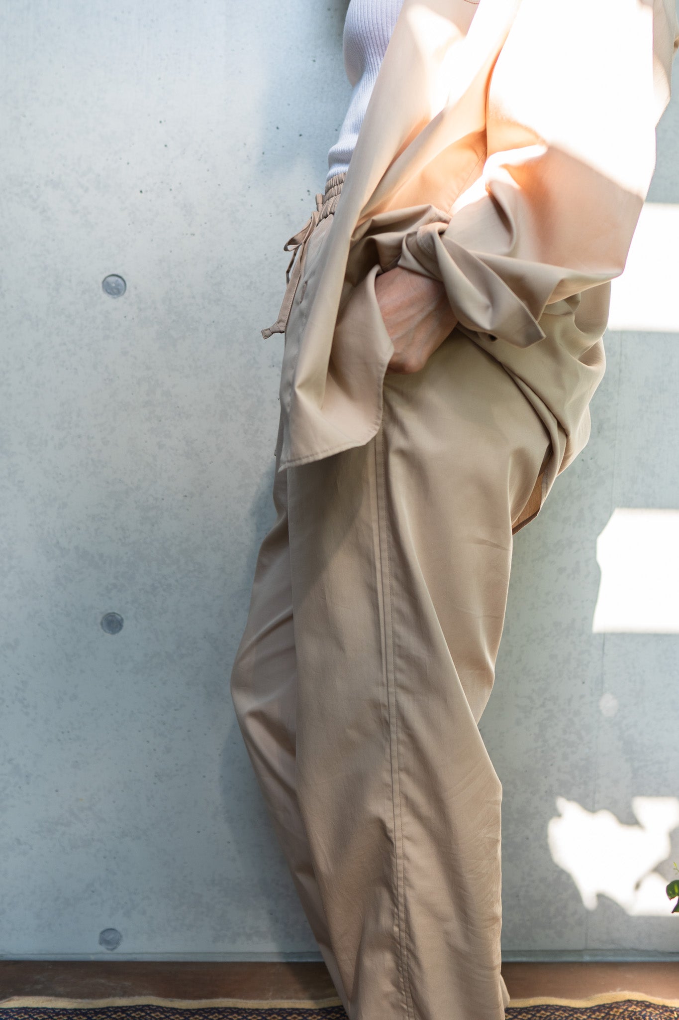 his pants-beige