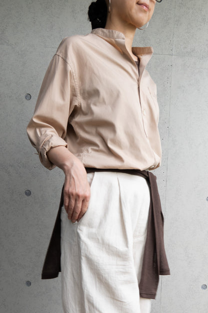 his shirt-beige