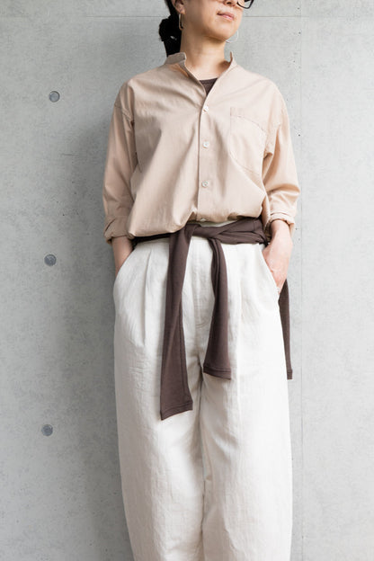 his shirt-beige