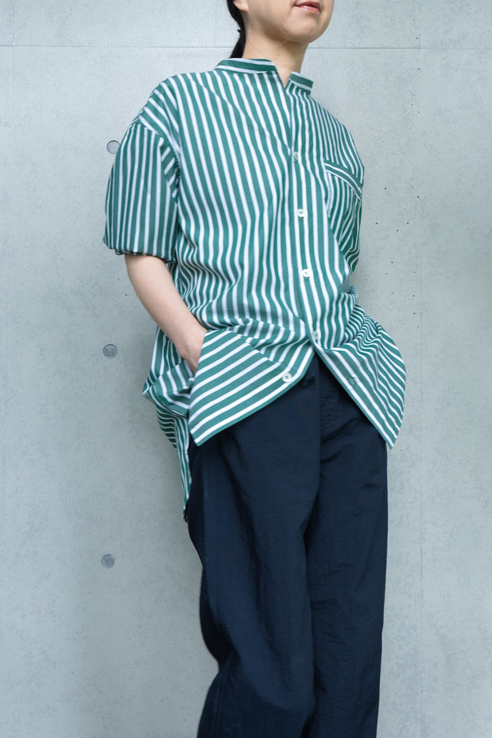 his shirt-green stripe